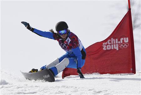 Austria's Julia Dujmovits competes during the women's parallel snowboard finals at the 2014 Sochi Winter Olympic Games in Rosa Khutor February 22, 2014. REUTERS/Dylan Martinez