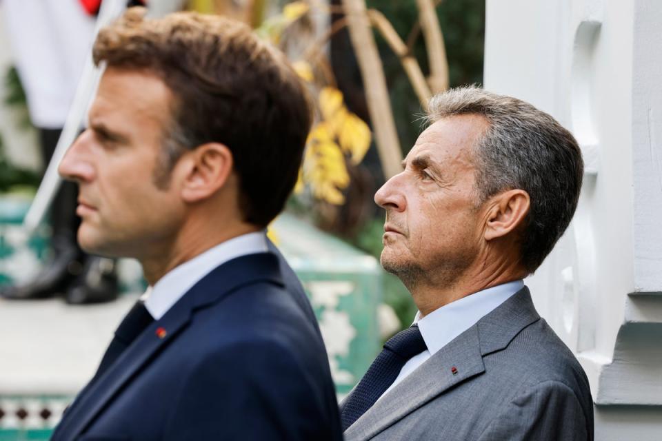 French President Emmanuel Macron with his predecessor Nicolas Sarkozy