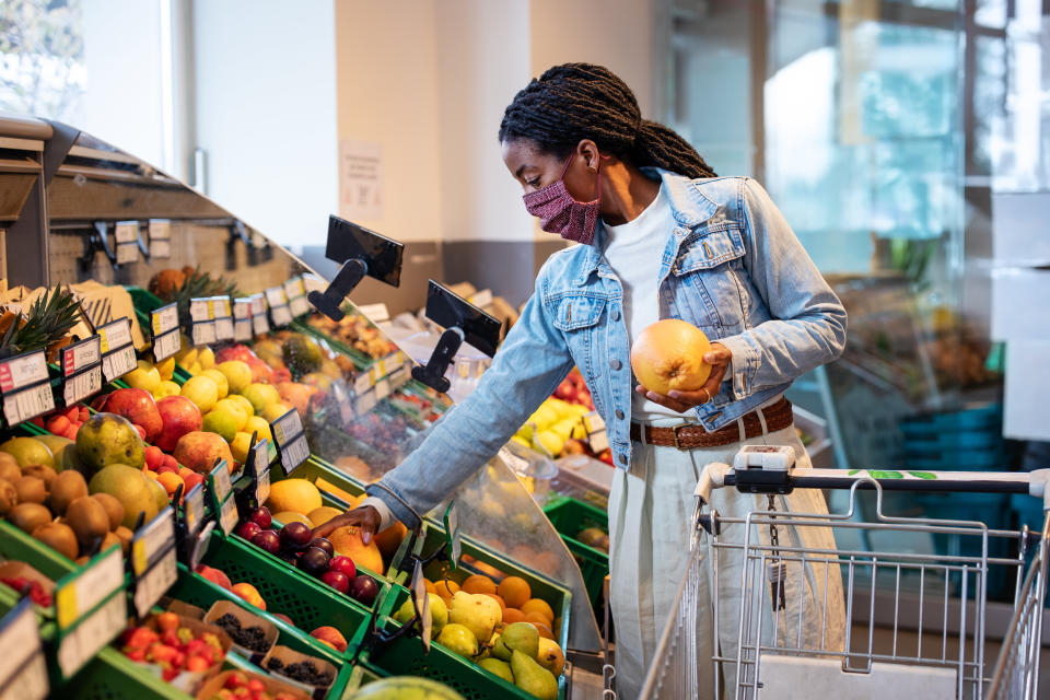 Health and safety concerns related to the pandemic add stress to the already-taxing chore of grocery shopping. (Photo: Luis Alvarez via Getty Images)