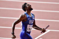 FILE - Noah Lyles of the United States reacts after winning the men's 4x100 meter relay final during the World Athletics Championships in Doha, Qatar, in this Saturday, Oct. 5, 2019, file photo. The U.S. Olympic track trials begin Friday night, June 18, 2021, at remodeled Hayward Field. Some of the biggest events over the first week figure to be the men's 100 meters where Noah Lyles -- one of the faces of the Tokyo Games -- kicks off his bid on a potential 100-200 double. (AP Photo/Martin Meissner, File)