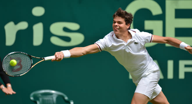 Canadia's Milos Raonic returns the ball to China's Ze Zhang during their first round match at the ATP Gerry Weber Open tennis tournament in the western German city of Halle on June 13, 2012. Raonic won 6-1, 6-1 and qualified for the quarter-finals. AFP PHOTO / CARMEN JASPERSENCARMEN JASPERSEN/AFP/GettyImages