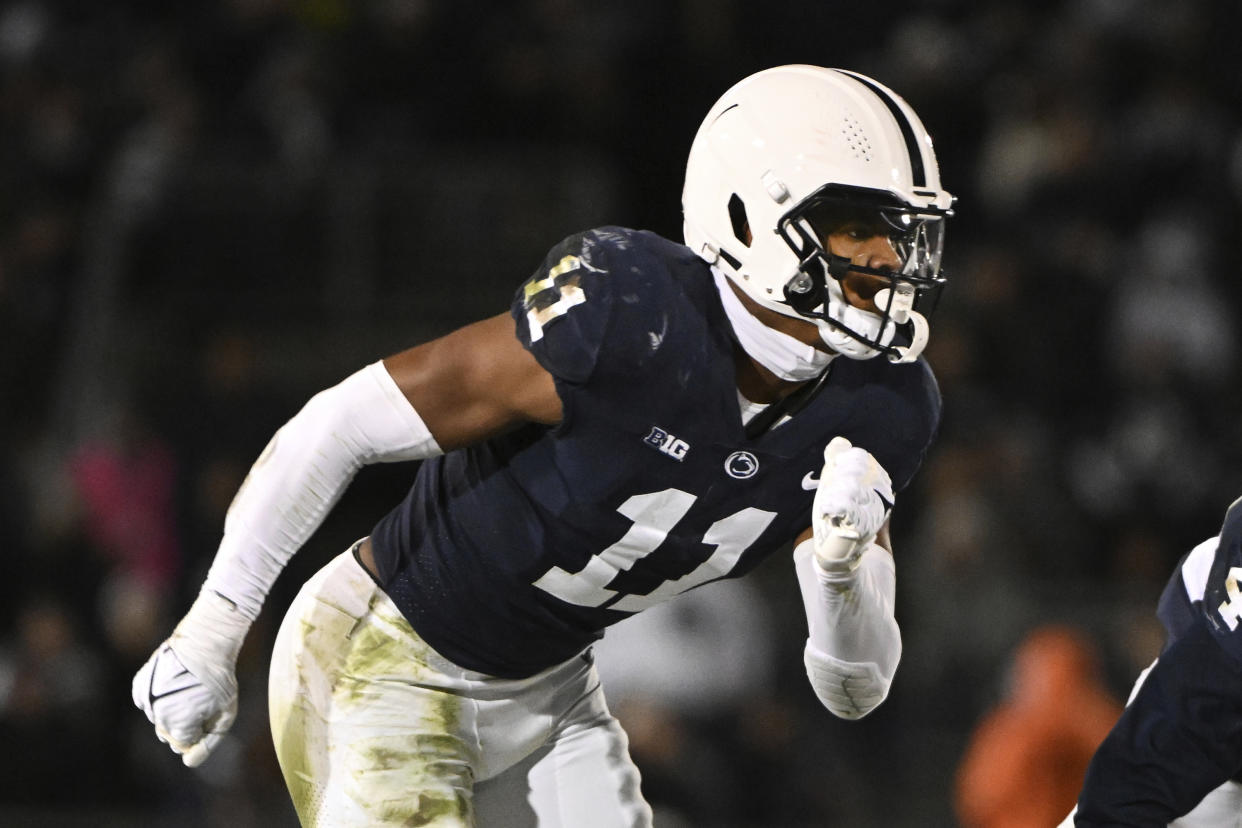 Penn State linebacker Abdul Carter (11) rushes during the first half of an NCAA college football game against Michigan State, Saturday, Nov. 26, 2022, in State College, Pa. (AP Photo/Barry Reeger)