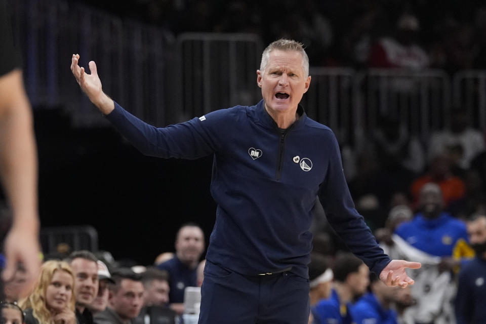 Golden State Warriors head coach Steve Kerr reacts in the first half of an NBA basketball game against the Atlanta Hawks Saturday, Feb. 3, 2024, in Atlanta. (AP Photo/John Bazemore)