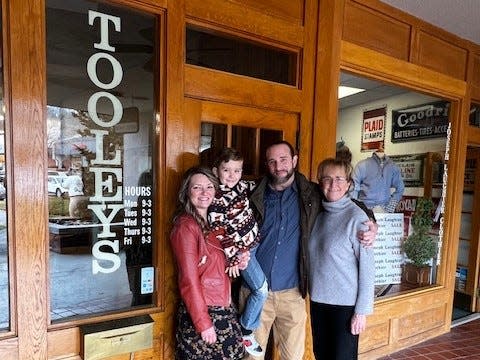 Ben Rieger recently moved back to the area and bought Tooley's Cafe to bring it back in the family. From left to right are his wife, Ashley, his son, Pierson, himself and his mother, Kathie Hunter.