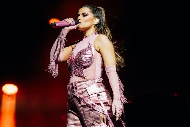 <p>Matt Winkelmeyer/Getty Images</p> Nelly Furtado performing at Coachella Weekend 1 in Indio, California on April 13, 2024