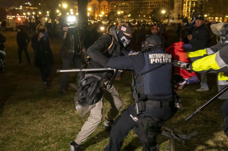 Pro-Trump rioters breach the security perimeter and penetrate the U.S. Capitol to disrupt the Electoral College vote count that would certify President-elect Joe Biden as the winner in Washington, D.C. on Jan. 6, 2021. File Photo by Ken Cedeno/UPI