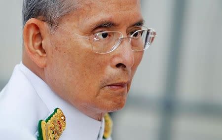 Thailand's King Bhumibol Adulyadej arrives to preside over the unveiling ceremony for the King Rama VIII monument in Bangkok June 9, 2012. REUTERS/Damir Sagolj/File Photo