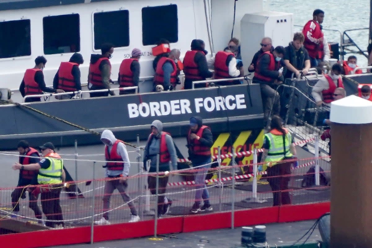 A group of people thought to be migrants are brought in to Dover on a Border Force vessel on July 21 2023 (PA)