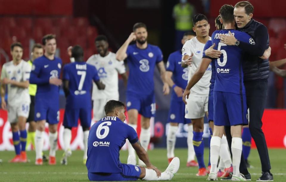 Thomas Tuchel celebrates with Jorginho but Thiago Silva sits on the ground