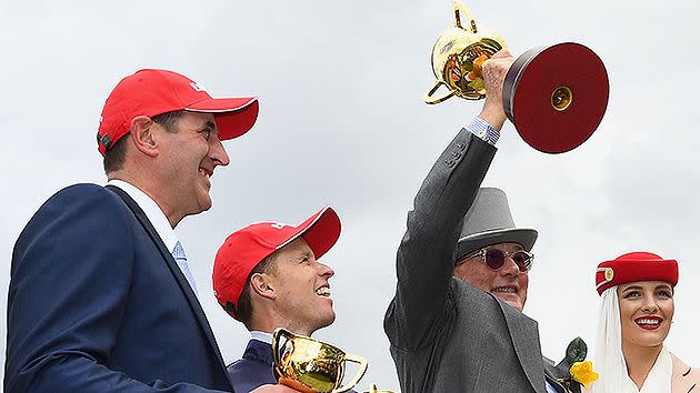 Almandin owner, jockey and trainer celebrate their Cup win. Pic: Getty