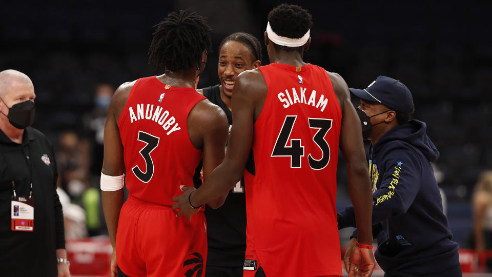 DeMar DeRozan catches up with his friends ahead of Wednesday's Raptors-Spurs game. (Photo by Scott Audette/NBAE via Getty Images)