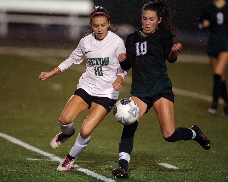 Seton forward Kenzie Carle, left, returns as one of the top players in the state after being a key contributor in the Saints winning a Division I state title in 2022.