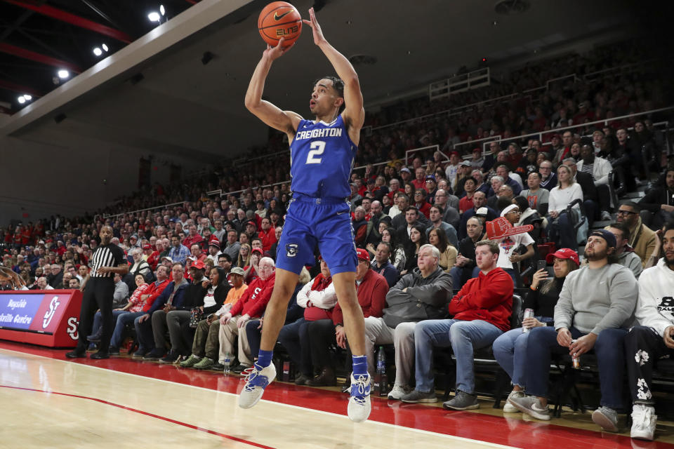 Creighton guard Ryan Nembhard (2) shoots a three point basket during the first half of an NCAA college basketball game against St. John's Saturday, Feb. 18, 2023, in New York. (AP Photo/Jessie Alcheh)