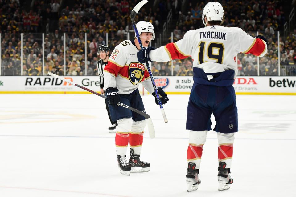 Florida Panthers center Anton Lundell (15) reacts with Florida Panthers left wing Matthew Tkachuk (19) after scoring a goal during the second period in game six of the second round of the 2024 Stanley Cup Playoffs against the Boston Bruins at TD Garden.