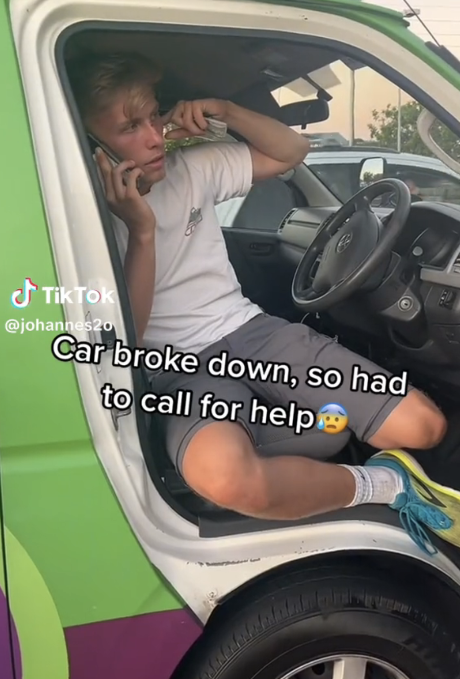 Rolv on the phone to get assistance for their car