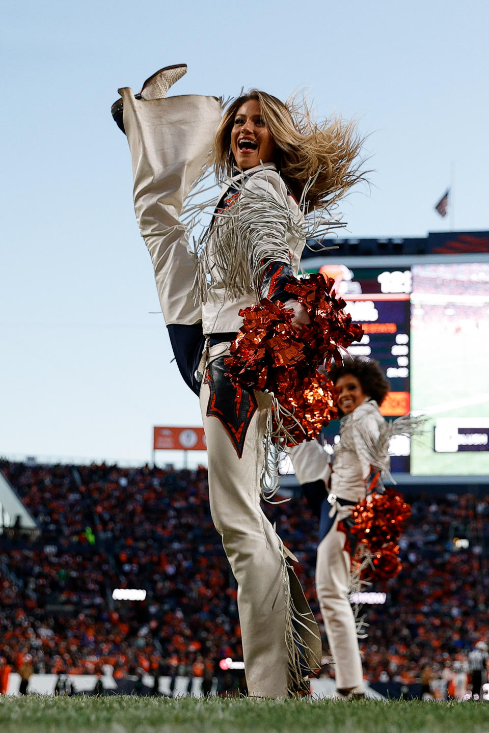 Nov 26, 2023; Denver, Colorado, USA; Denver Broncos cheerleaders perform in the fourth quarter against the Cleveland Browns at Empower Field at Mile High. Mandatory Credit: Isaiah J. Downing-USA TODAY Sports