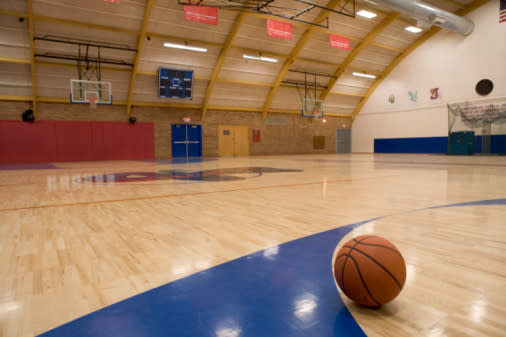 Basketball on gym floor