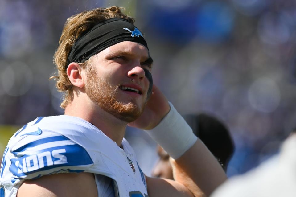 Detroit Lions defensive end Aidan Hutchinson (97) stands on the sideline during the first half against the Baltimore Ravens at M&T Bank Stadium in Baltimore on Sunday, Oct. 22, 2023.