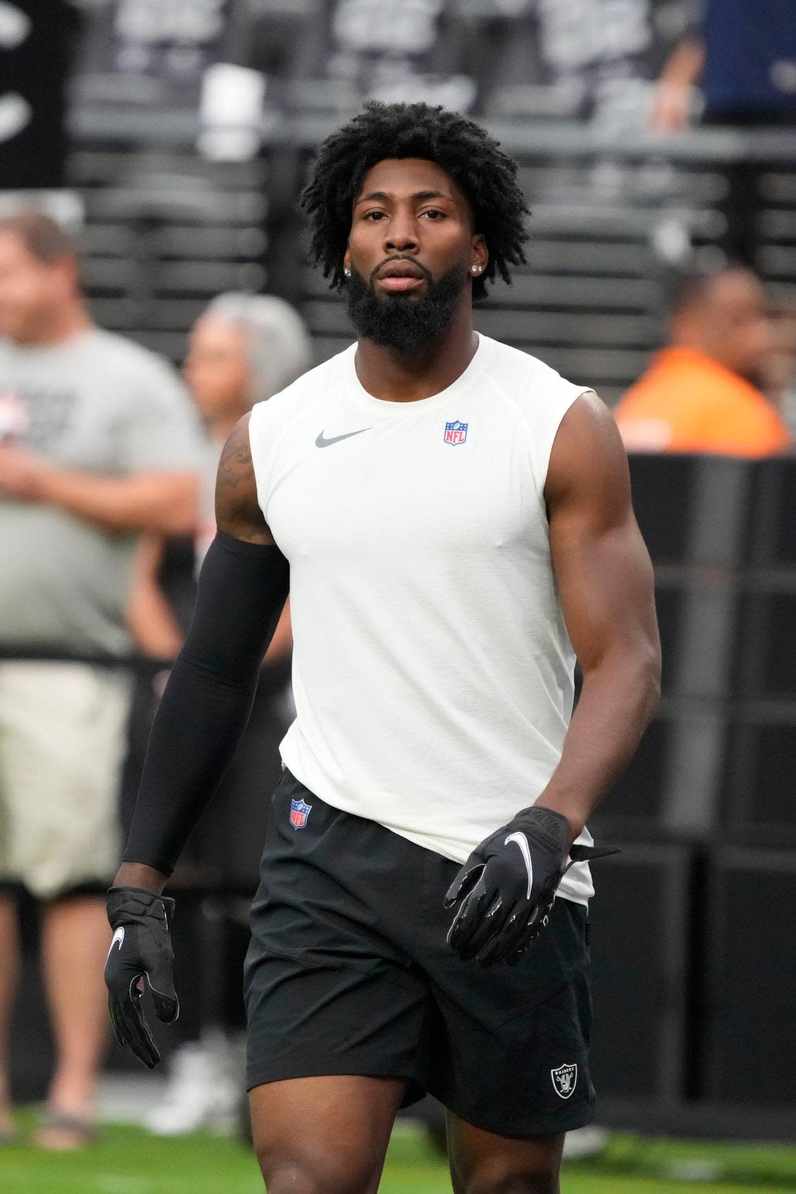 Raiders cornerback Nate Hobbs warms up before an NFL preseason football game against the New England Patriots, Friday, Aug. 26, 2022, in Las Vegas.