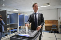 Netherlands Prime Minister Mark Rutte casts his ballot for the European elections in The Hague, Netherlands, Thursday, May 23, 2019. (AP Photo/Phil Nijhuis)