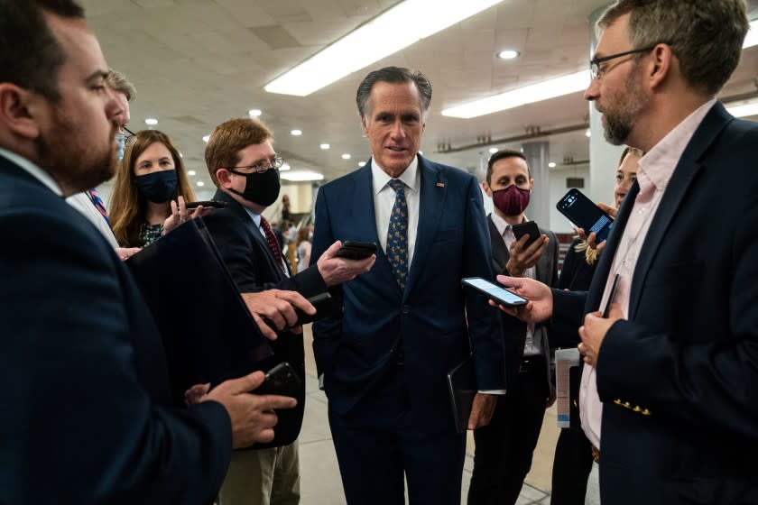 WASHINGTON, DC - JULY 21: Sen. Mitt Romney (R-UT) speaks with reporters in the Senate side of the U.S. Capitol Building on Wednesday, July 21, 2021. (Kent Nishimura / Los Angeles Times)