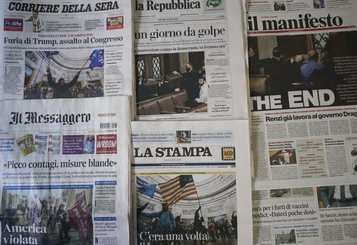 Image: Italian newspapers (Andrew Medichini / AP)