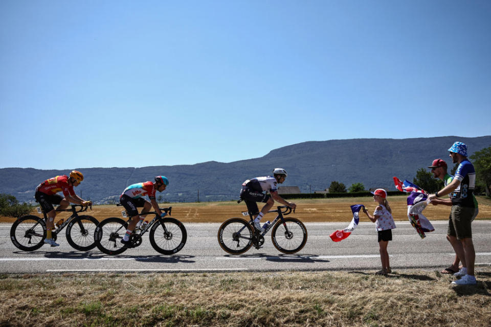 (From L) Uno-X Pro Cycling Team's Norwegian rider Jonas Abrahamsen, Lotto Dstny's Belgian rider Victor Campenaerts and Soudal Quick-Step's Danish rider Kasper Asgreen cycle in a breakaway during the 18th stage of the 110th edition of the Tour de France cycling race, 184 km between Moutiers and Bourg-en-Bresse, in the French Alps, on July 20, 2023. (Photo by Anne-Christine POUJOULAT / AFP)