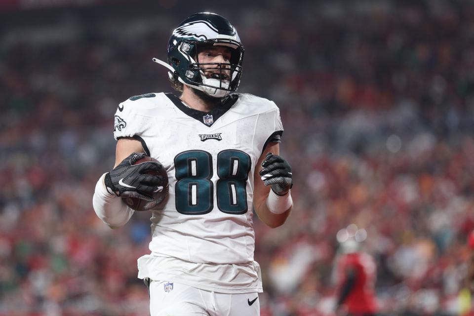 Jan 15, 2024; Tampa, Florida, USA; Philadelphia Eagles tight end Dallas Goedert (88) scores a touchdown against the Tampa Bay Buccaneers after a reception during the first half of a 2024 NFC wild card game at Raymond James Stadium. Mandatory Credit: Nathan Ray Seebeck-USA TODAY Sports