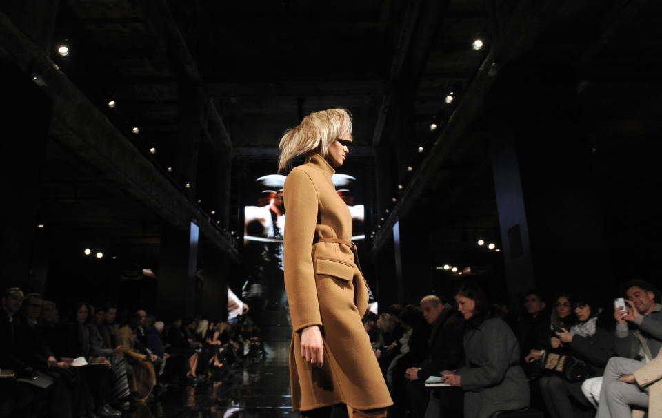 The Donna Karan New York Fall 2014 collection is modeled during Fashion Week, Monday, Feb. 10, 2014, at 23 Wall Street in New York. (AP Photo/Diane Bondareff)