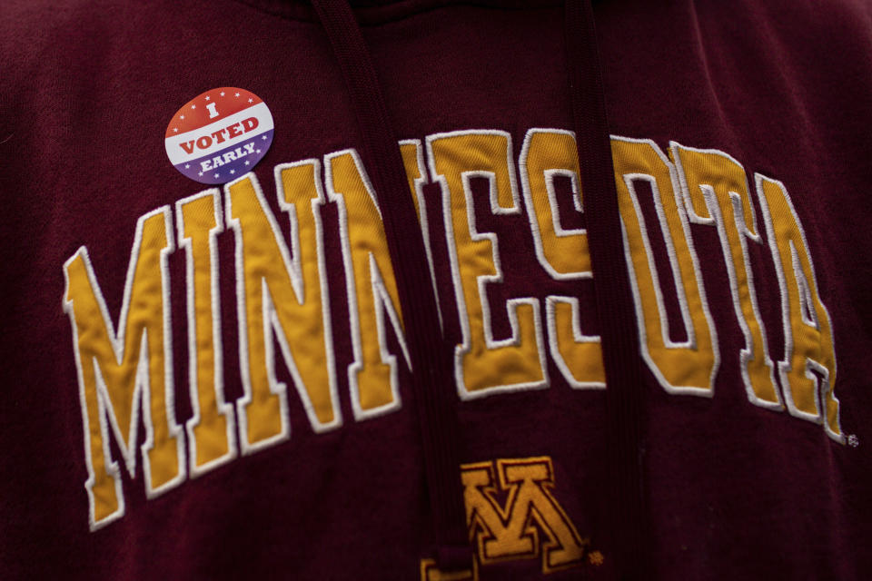 Joseph Phalen wears an "I voted early" sticker after casting his ballot on Friday, Sept. 23, 2022, in Minneapolis. With Election Day still more than six weeks off, the first votes of the midterm election were already being cast Friday in a smattering of states including Minnesota. (AP Photo/Nicole Neri)