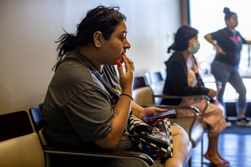 SAN ANTONIO, TX- JUNE 24, 2022: Sitting in the waiting room, a patient who wished to be known only by her first name, Liz, contemplates her abortion choices after just being told that the Supreme Court overturned Roe v. Wade shutting down abortion series at Alamo Women's Reproductive Services where she had an appointment on June 24, 2022 in San Antonio, Texas. The clinic had to turn patients away once the ruling came down.(Gina Ferazzi / Los Angeles Times)