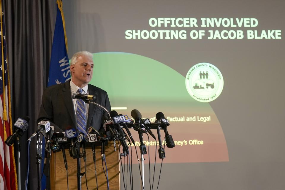 CORRECTS LAST NAME TO BLAKE FROM BLACK-Kenosha County District Attorney Michael Graveley speaks at a news conference Tuesday, Jan. 5, 2021, in Kenosha, Wis. Graveley announced that no charges will be filed against the white police officer that shot Jacob Blake, a Black man in August. (AP Photo/Morry Gash)