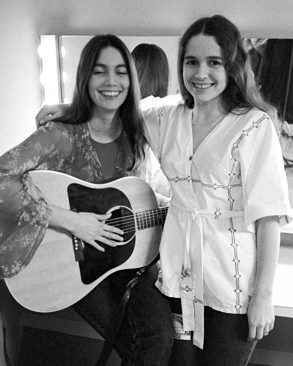 Larson backstage with Emmylou Harris on Feb. 3, 1977, in San Rafael, California - Credit: Ed Perlstein/Redferns/Getty Images