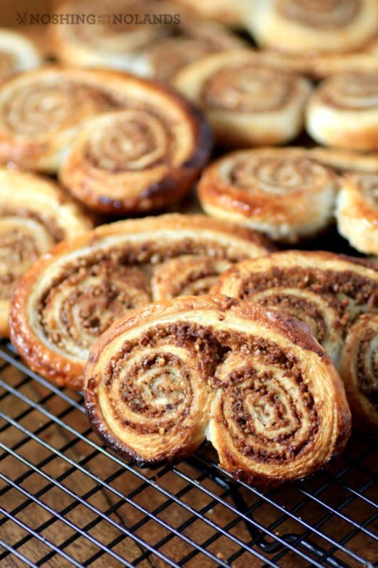 <p>Cinnamon Pecan Elephant Ears are possibly the easiest cookie you can make. A perfect, quick and easy holiday idea! </p><p>Get the recipe: <a href="http://noshingwiththenolands.com/cinnamon-pecan-elephant-ears-creativecookieexchange/" rel="nofollow noopener" target="_blank" data-ylk="slk:Cinnamon Pecan Elephant Ears;elm:context_link;itc:0;sec:content-canvas" class="link rapid-noclick-resp"><strong>Cinnamon Pecan Elephant Ears</strong></a></p>