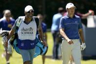 Jordan Spieth, right, and his caddie walk along the second hole during the second round of the Charles Schwab Challenge golf tournament at the Colonial Country Club, Friday, May 27, 2022, in Fort Worth, Texas. (AP Photo/LM Otero)