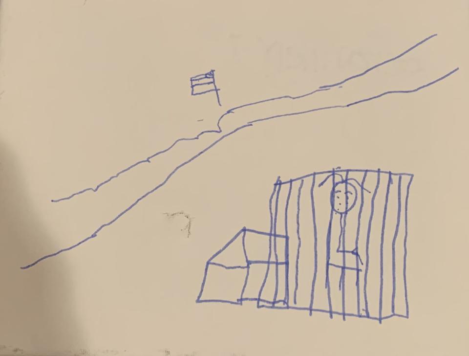 An unidentified 7-year-old child living at a tent encampment in Matamoros, across the border from Brownsville, Texas, draws herself in a cage. | Courtesy of Belinda Arriaga