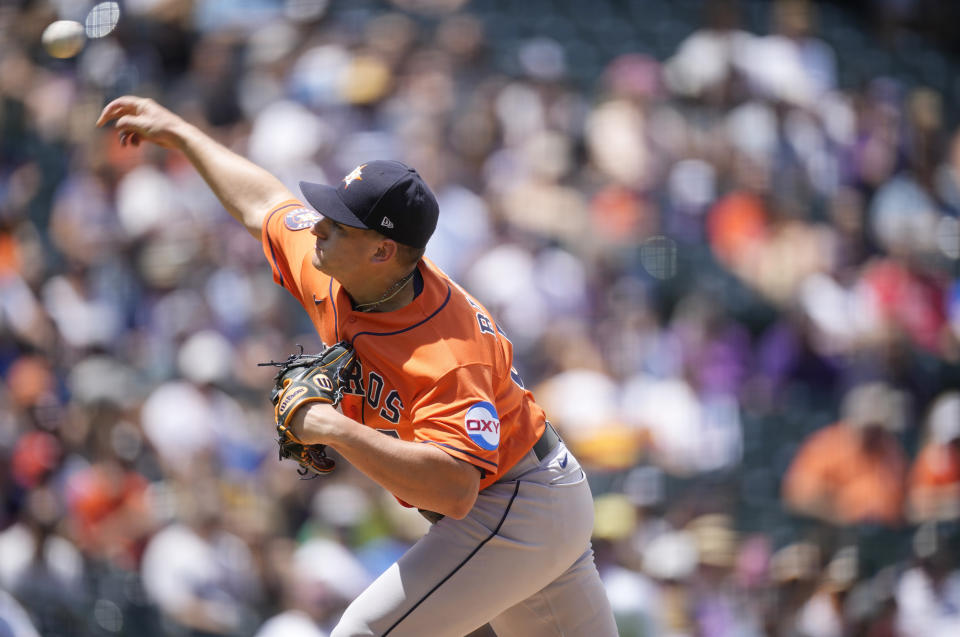 Houston Astros starting pitcher Brandon Bielak works against the Colorado Rockies in the first inning of a baseball game Wednesday, July 19, 2023, in Denver. (AP Photo/David Zalubowski)