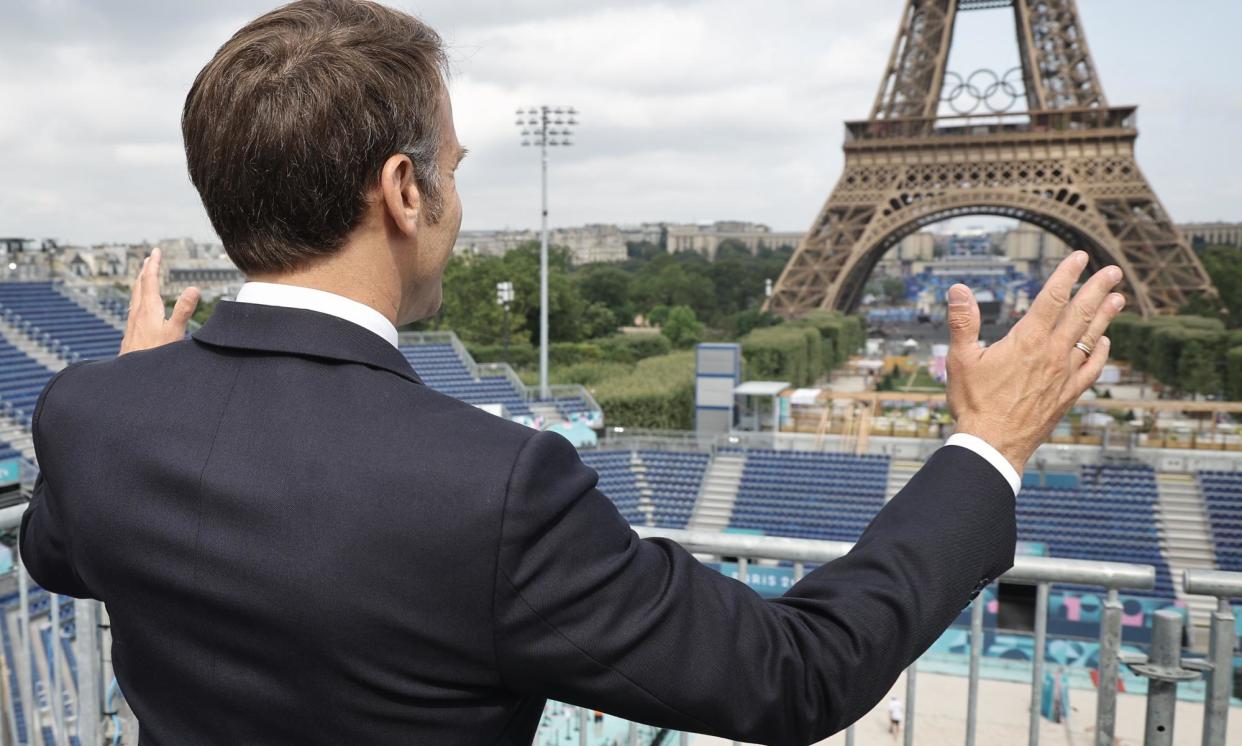 <span>‘This is magnificent’ Emmanuel Macron said as volunteers prepared the site.</span><span>Photograph: Christophe Petit-Tesson/EPA</span>