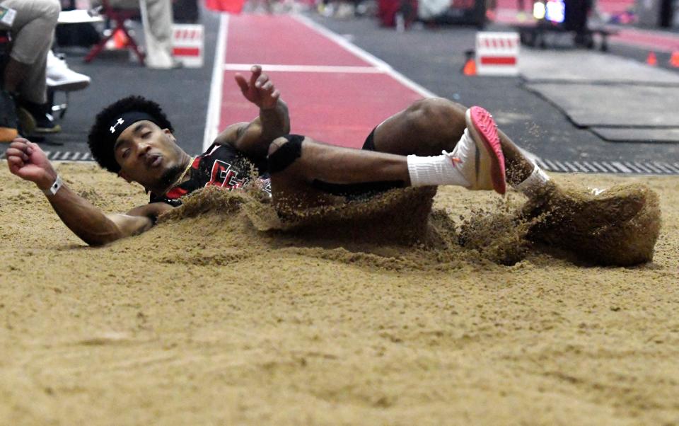 Texas Tech's Chris Welch competes in the triple jump during Saturday's second day of the Big 12 indoor track and field championships. The senior from Dickinson won the event on his final attempt.