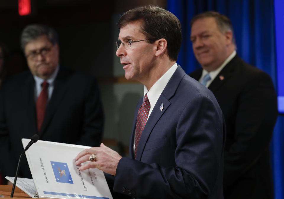 US Defense Secretary Mark Esper, with Secretary of State Mike Pompeo (R) and Attorney General William Barr, speaks at a joint news conference on the International Criminal Court at the State Department in Washington, DC, on June 11, 2020. (Yuri Gripas/AFP via Getty Images)