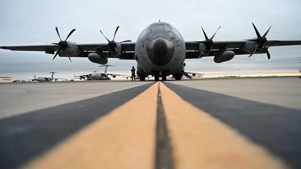 A WC-130J Super Hercules aircraft from the 53rd Weather Reconnaissance Squadron sits on the flight line prior to an atmospheric river mission in 2020 at Travis Air Force Base, California.