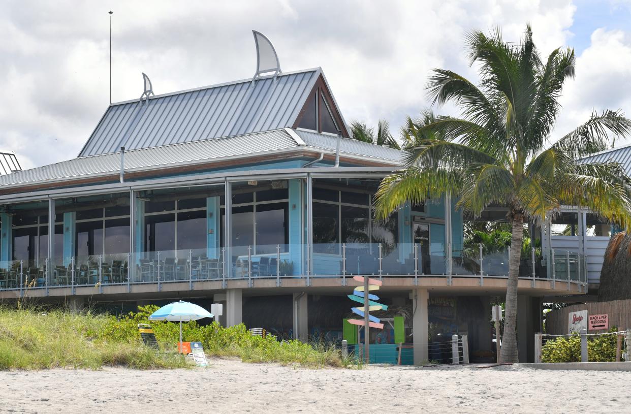 The Venice Pier Group delivered rent and profit sharing checks for Fins at Sharky's, pictured here, and Sharky's on the Pier to the Venice City Council Tuesday.