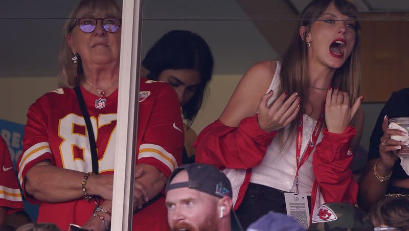 Taylor Swift, right, watches from a suite alongside Travis Kelce’s mother, Donna Kelce, inside Arrowhead Stadium during game between the Chicago Bears and Kansas City Chiefs Sunday, Sept. 24, 2023, in Kansas City, Mo.