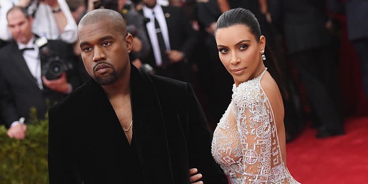 new york, ny may 04 kanye west l and kim kardashian attend the china through the looking glass costume institute benefit gala at the metropolitan museum of art on may 4, 2015 in new york city photo by mike coppolagetty images