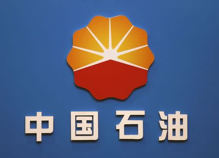 The company logo of PetroChina is displayed at a news conference in Hong Kong in this March 25, 2009 file photo. REUTERS/Bobby Yip/Files