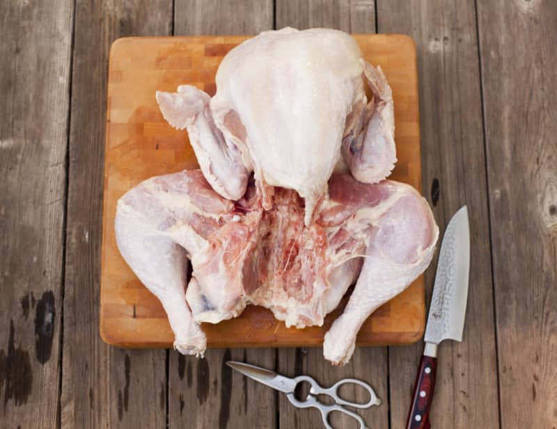 <span> A spatchcocked turkey (Image credit: <a href="https://www.thekitchn.com/authors/leela" rel="nofollow noopener" target="_blank" data-ylk="slk:Leela Cyd;elm:context_link;itc:0;sec:content-canvas" class="link ">Leela Cyd</a>)</span>