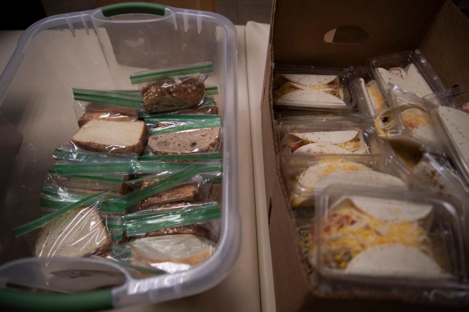 Prepared lunches of chili tacos are stored to be packed into bags later at First United Methodist Church in downtown South Bend on June 14, 2023.