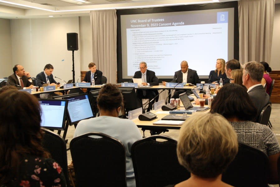 The University of North Carolina at Chapel Hill Board of Trustees convenes for a regular meeting at the UNC Center for School Leadership Development in Chapel Hill, N.C., on Thursday, May 16, 2024. The meeting came a few days after the board voted to cut $2.3 million of diversity spending to reallocate toward public safety. (AP Photo/Makiya Seminera)