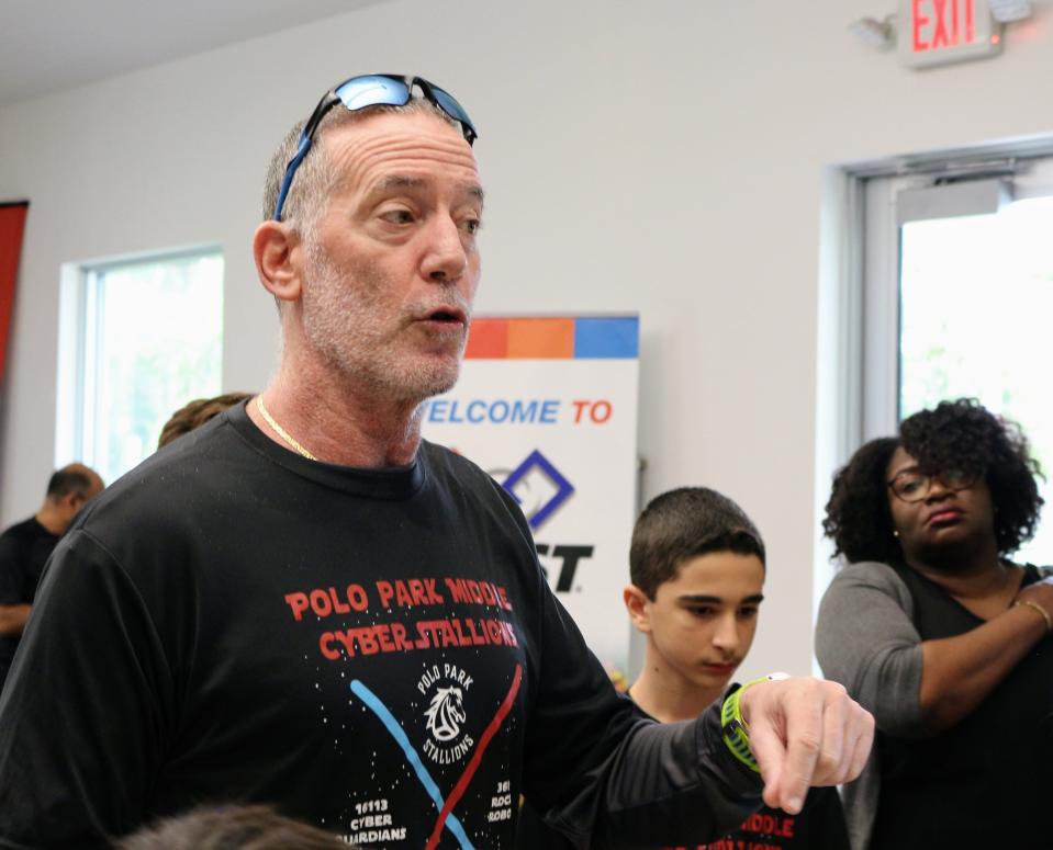 Polo Park Middle School teacher and robotics coach David Grad explains FIRST Lego competition logistics at the Cox Science Center and Aquarium on Saturday, Sept. 17, 2022.