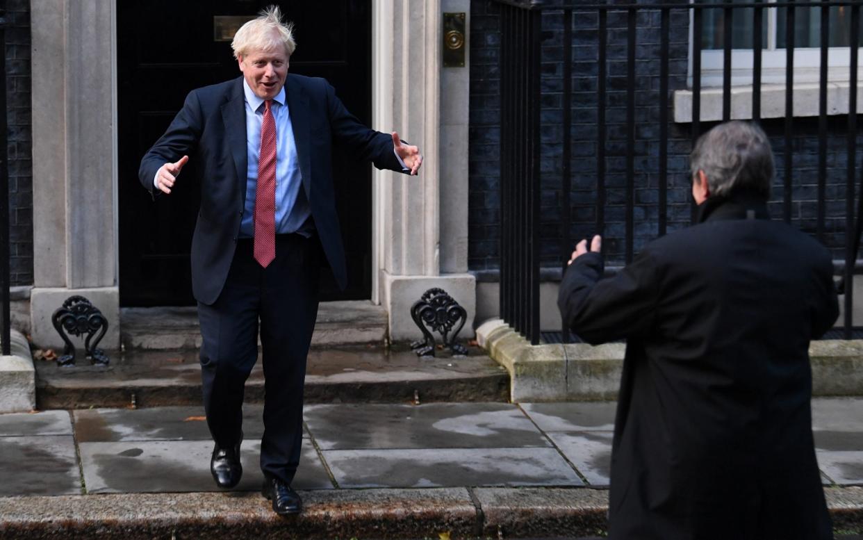 Boris Johnson greets European Parliament president David Sassoli in Downing Street yesterday - REX